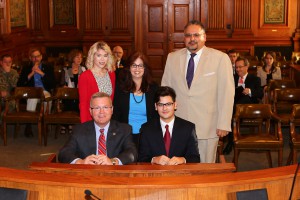 From front left: Sen. David Pearce with Mathew Martinez, girlfriend Katie Legate and parents Cynthia and Richard Martinez during the Gubernatorial Appointments Committee hearing, Wednesday, March 16.