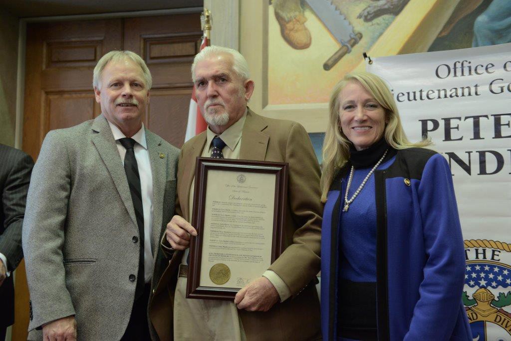 From left: Rep. Pietzman, Terry Martin and Sen. Riddle with the 2015 Veteran’s Service Award Tuesday, March 1.
