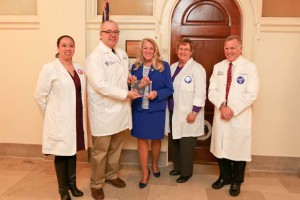 Sen. Riddle is presented an award from the MOAAP. From left: Dr. Linh Pham, Dr. Ken Haller, Sen. Jeanie Riddle, Dr. Beth Simpson and Dr. Stuart Sweet
