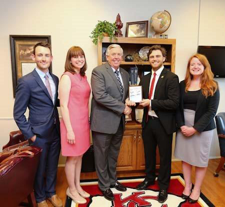 Senator Parson receives the ASUM Legislator of the Year Award on Wednesday, May 11, 2016. Steven Chaffin, Katie Blaue, Senator, Michael Steelman, and Kaitlin Steen presenting award.