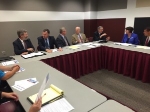 From left: Leroy Wade, Brian Fogle, Sen. David Pearce and Clif Smart discuss SB 997 at Wednesday’s event.
