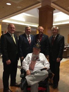 From Left to Right: Sen. Denny Hoskins, Lt. Gov. Mike Parsons, Rep. Charlie Davis and Sen. Wayne Wallingford meet a veteran at St. James Veterans Home.