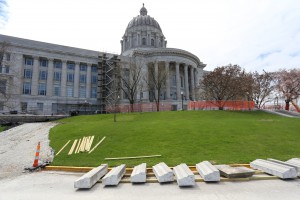 Contractors are currently performing stone work, including drilling and grinding operations on the building’s exterior stone