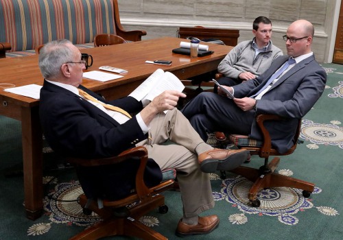 Sen.-elect Tony Luetkemeyer, right, discusses floor activity and decorum with Missouri Senate Sergeant at Arms Bill Smith.