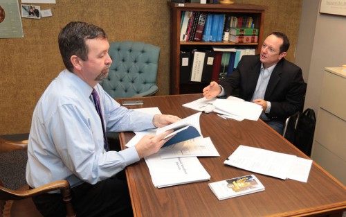 Director of Senate Research Jim Ertle reviews the process of preparing bills with Sen.-elect Eric Burlison during a new senator orientation at the Missouri State Capitol.