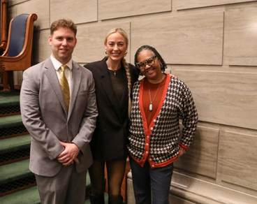 A group of people posing for a photoAI-generated content may be incorrect.