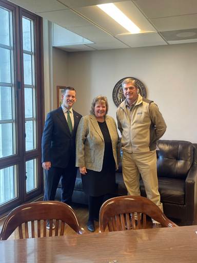 A group of people posing for a photoAI-generated content may be incorrect.