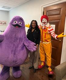 A picture containing indoor, purpleAI-generated content may be incorrect.